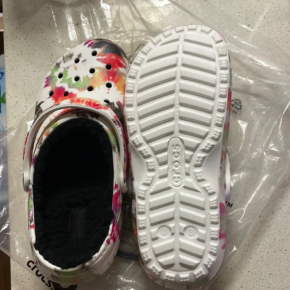 New and never used classic lined CROCS
